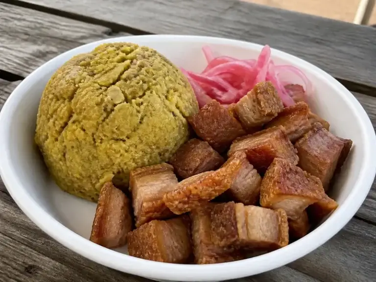 Chicharrón mofongo with crispy fried pork belly and pickled red onions